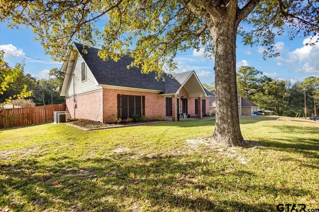 a house with trees in front of it