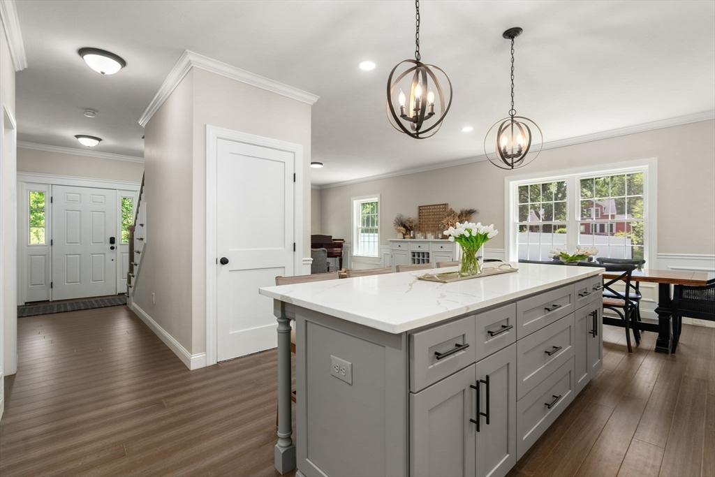 275 Chestnut Street Hudson, MA 01749 - Photo 2 of 34 a kitchen with a counter space and wooden floor