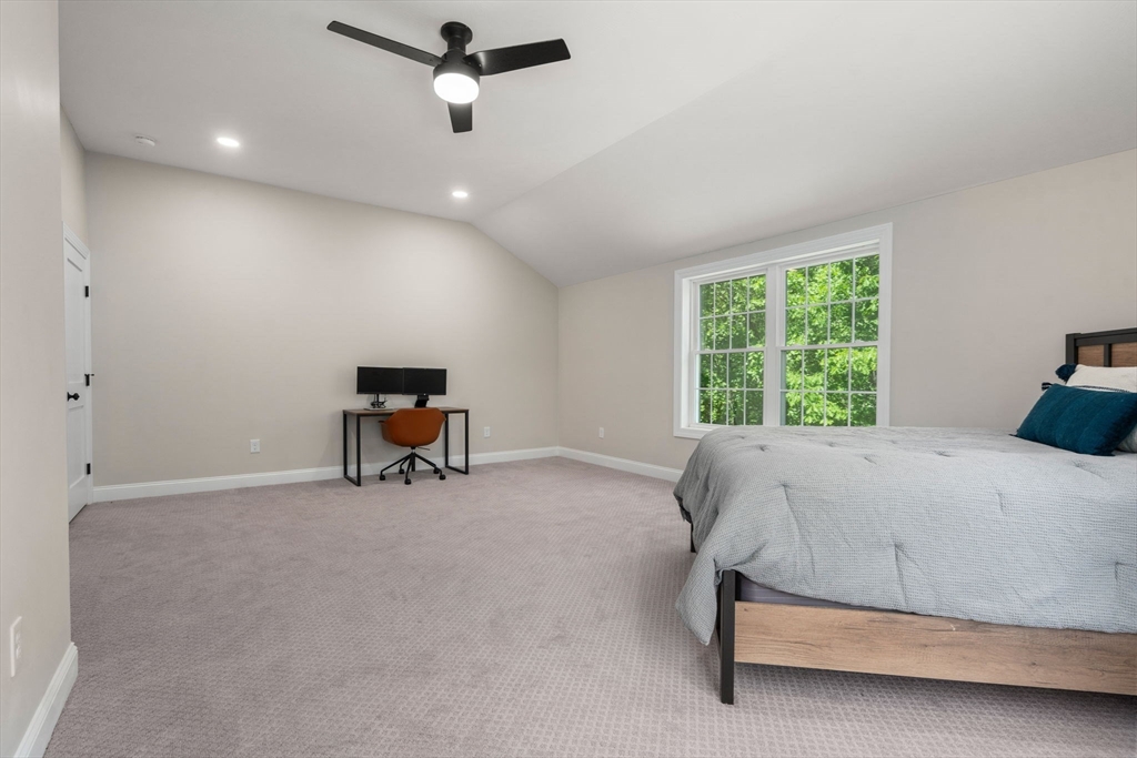 275 Chestnut Street Hudson, MA 01749 - Photo 22 of 34 a bed room with a bed and a chair