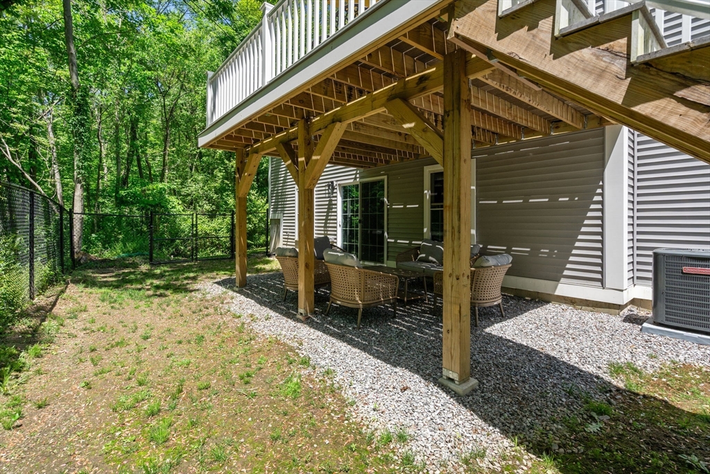 275 Chestnut Street Hudson, MA 01749 - Photo 29 of 34 a view of a house with backyard