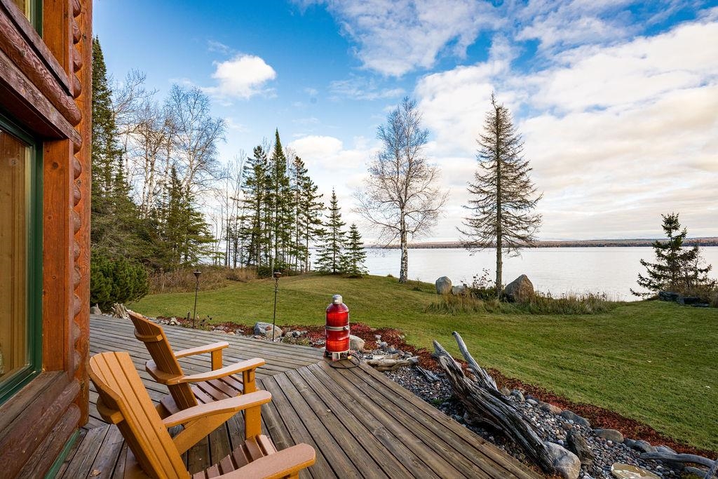 90190 Bark Point Road Herbster, WI 54844 - Photo 3 of 42 Deck featuring a water view and a yard