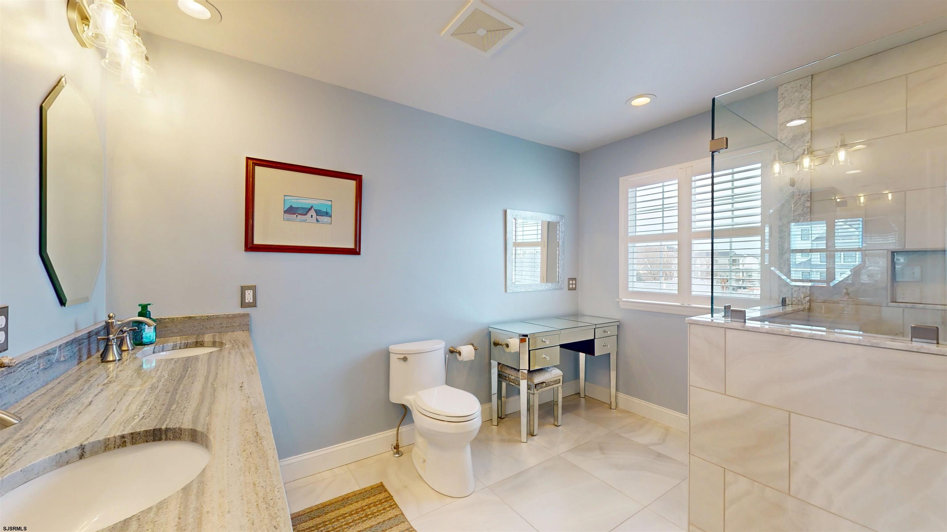 201 25th Street South Brigantine, NJ 08203 - Photo 38 of 60 a view of a dining room with furniture and a large window