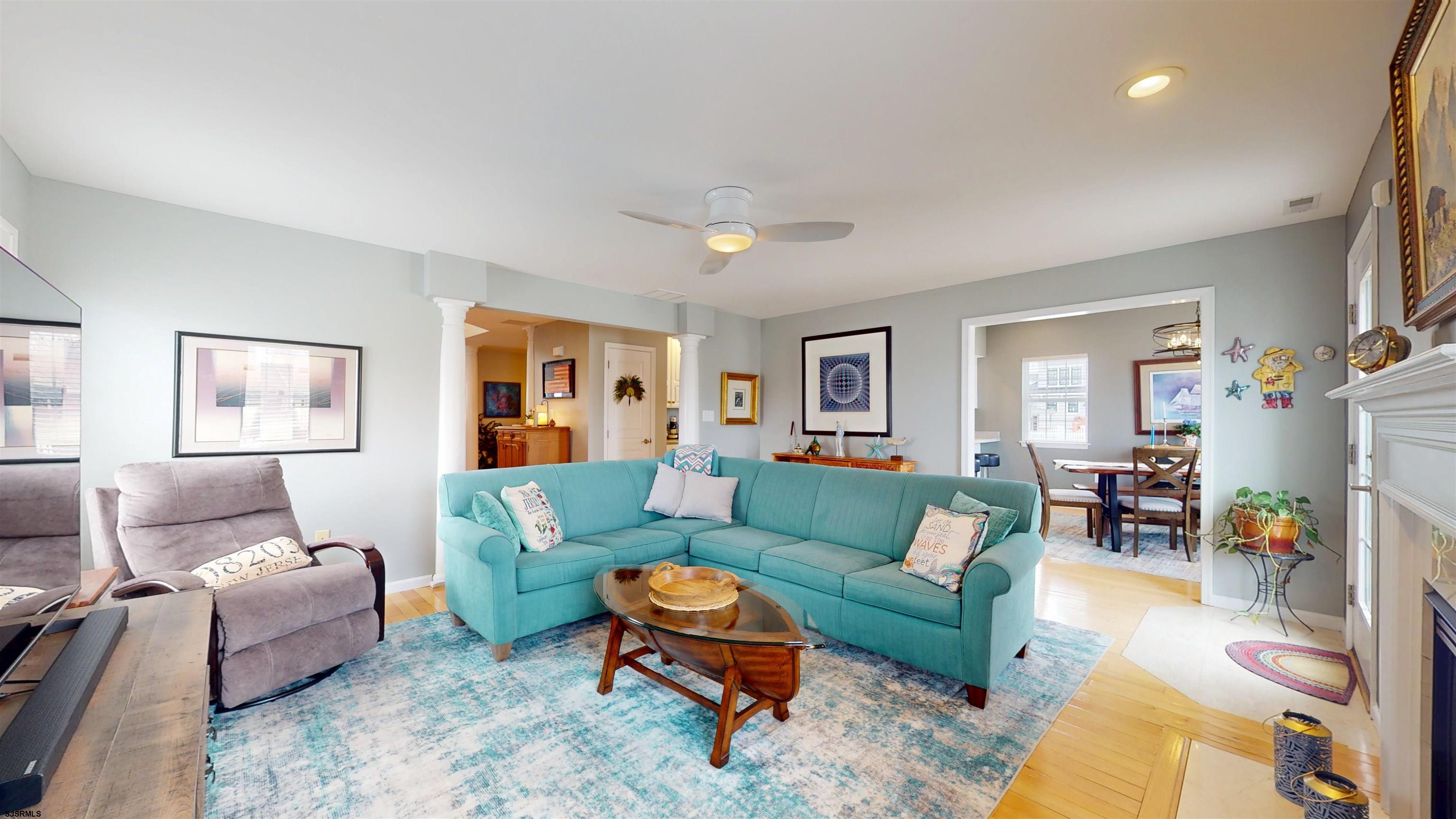 201 25th Street South Brigantine, NJ 08203 - Photo 10 of 60 a living room with furniture and a wooden floor