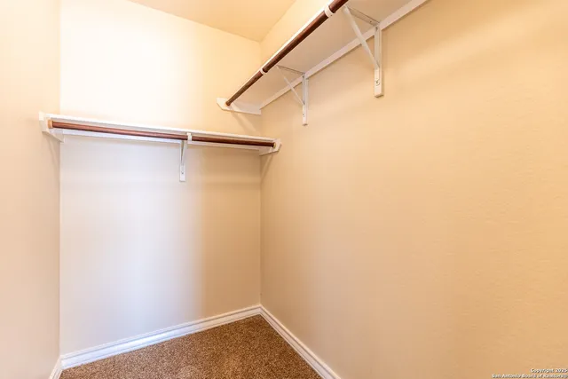a view of small space with racks on the wall