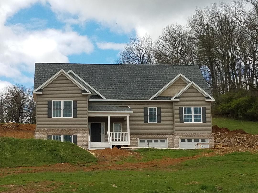 4461 Old Stage Road Radford, VA 24141 - Photo 1 of 21 front view of a house with a yard