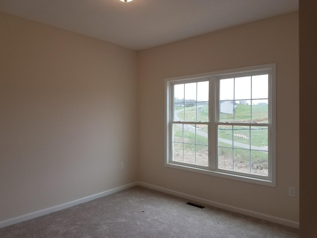 4461 Old Stage Road Radford, VA 24141 - Photo 14 of 21 an empty room with a window