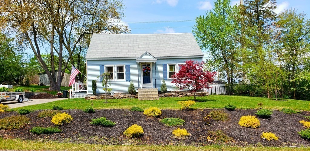 3 Harvey Road Chelmsford, MA 01824 - Photo 1 of 39 a front view of house with yard and green space