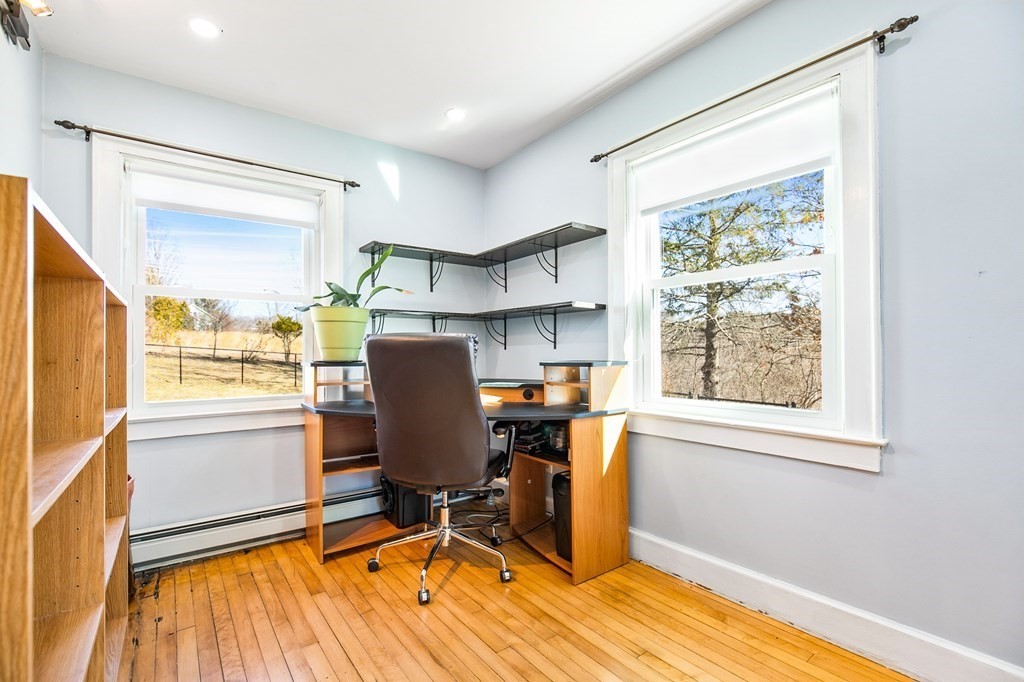 3 Harvey Road Chelmsford, MA 01824 - Photo 14 of 39 a workspace with wooden floor and a window