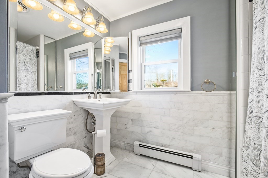 3 Harvey Road Chelmsford, MA 01824 - Photo 16 of 39 a bathroom with a sink toilet and mirror