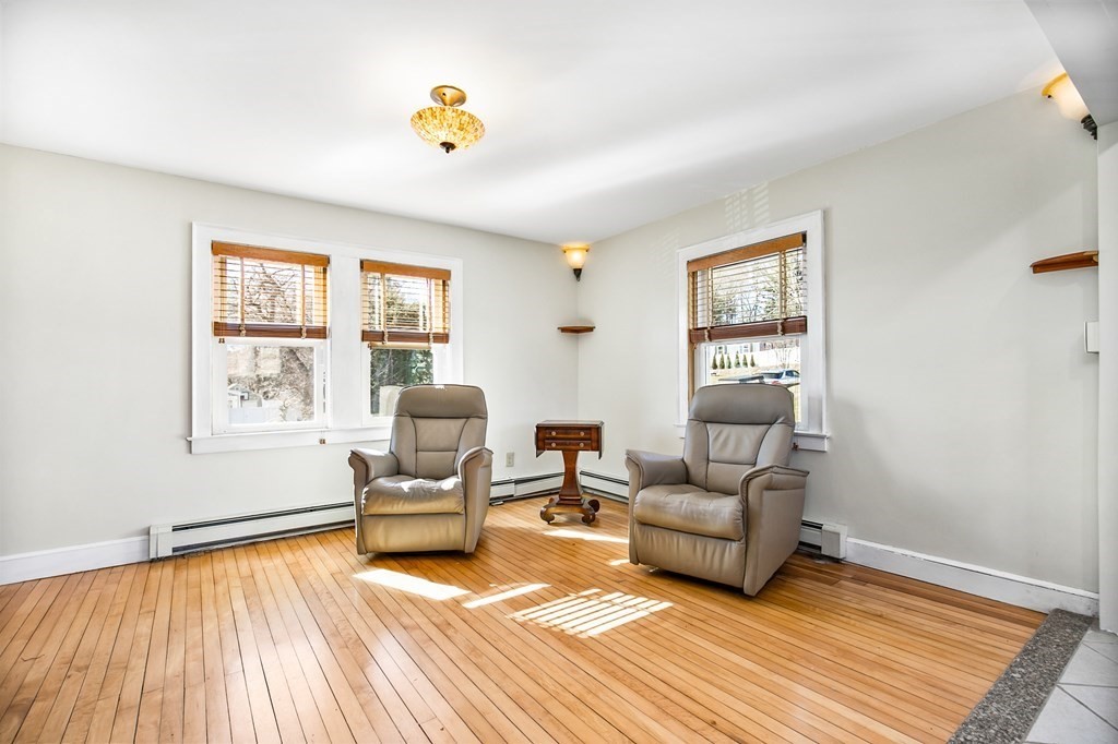 3 Harvey Road Chelmsford, MA 01824 - Photo 20 of 39 a living room with furniture and a window
