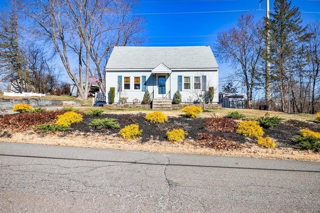 3 Harvey Road Chelmsford, MA 01824 - Photo 2 of 39 a front view of house with yard clothes and sitting area