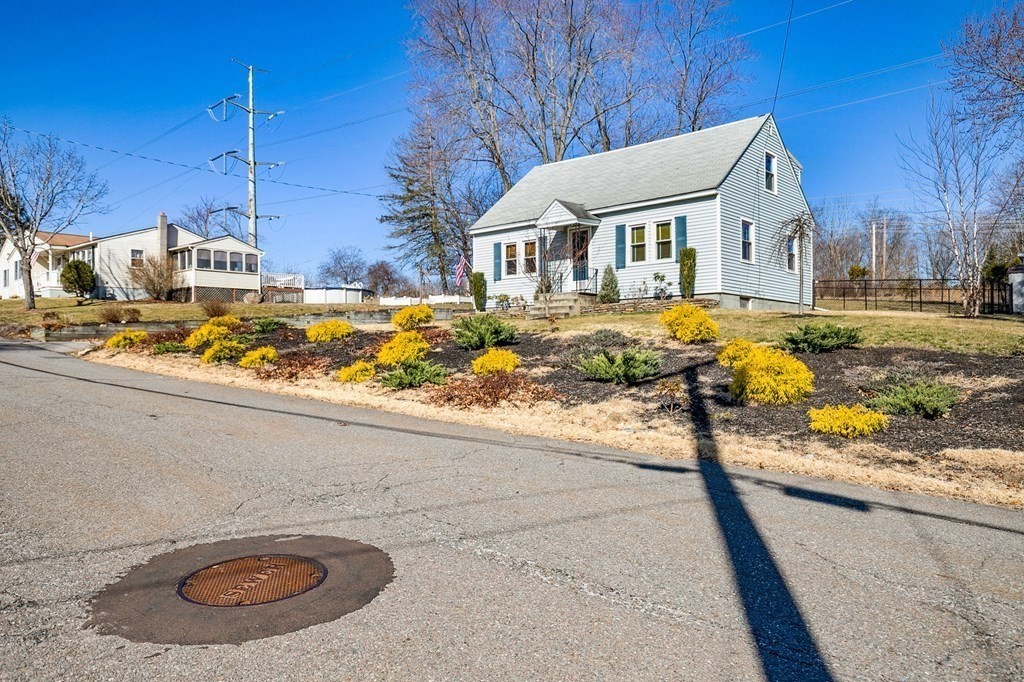 3 Harvey Road Chelmsford, MA 01824 - Photo 3 of 39 a view of a house with backyard and trees
