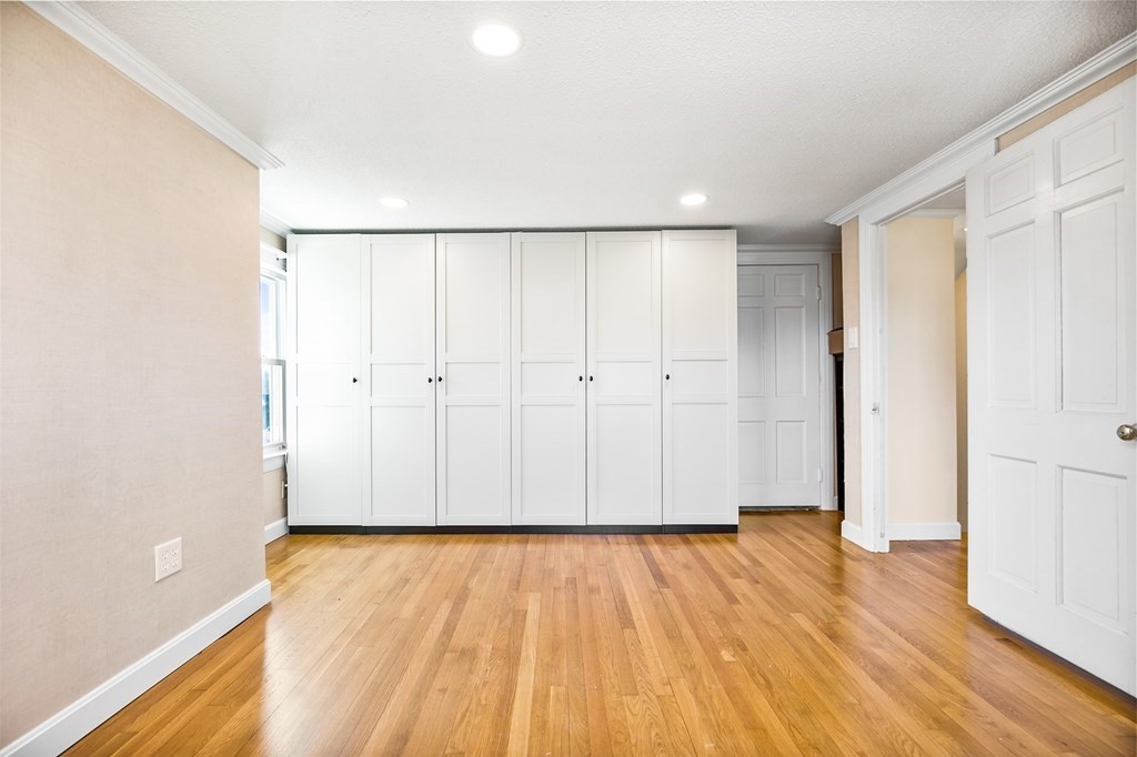 3 Harvey Road Chelmsford, MA 01824 - Photo 33 of 39 a view of an empty room with wooden floor