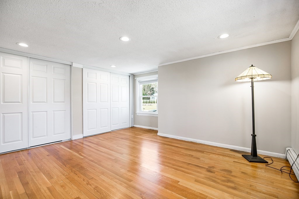3 Harvey Road Chelmsford, MA 01824 - Photo 36 of 39 a view of an empty room with wooden floor