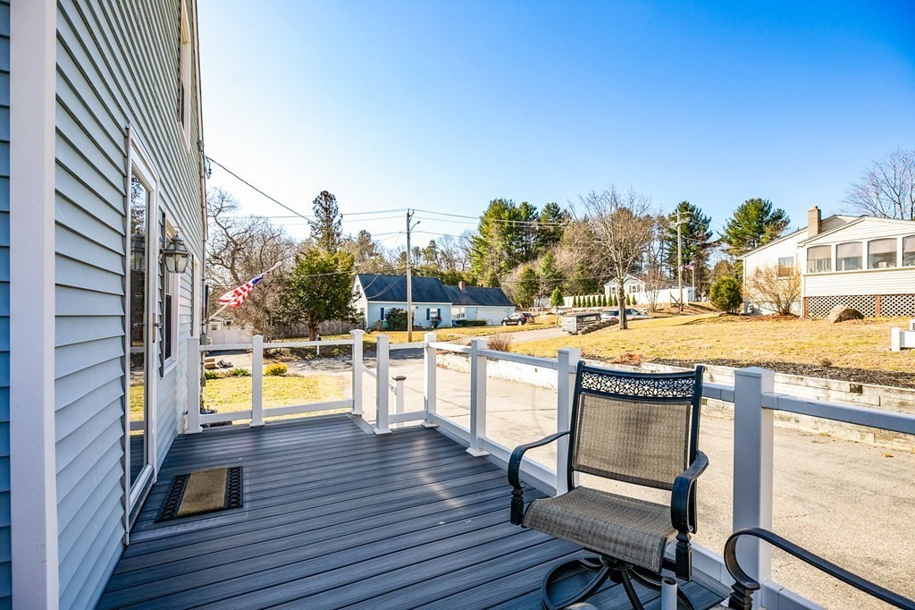 3 Harvey Road Chelmsford, MA 01824 - Photo 6 of 39 a view of a swimming pool with a lounge chair