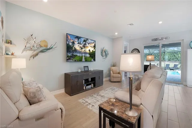 a living room with furniture and a couch