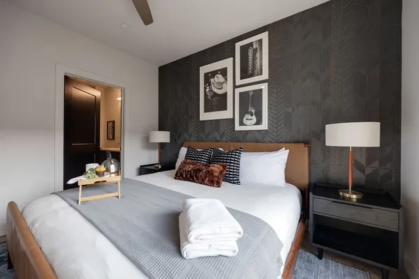 a bathroom with a mirror and a shower