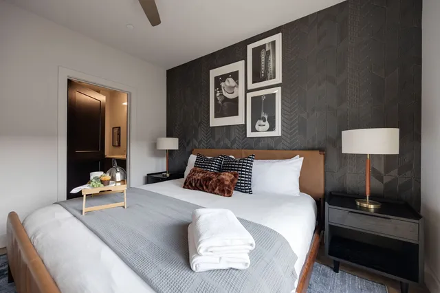 a bathroom with a mirror and a shower