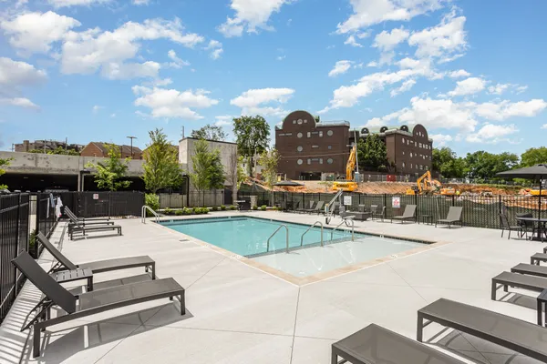 a view of a house with swimming pool