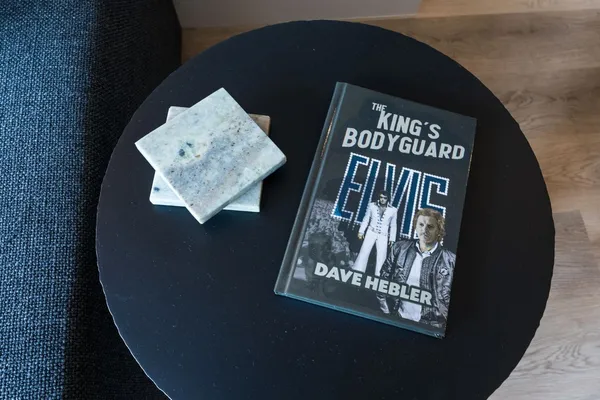 a vase of flowers sitting on a table