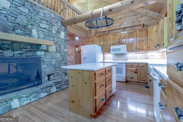 a view of a chairs in wooden deck