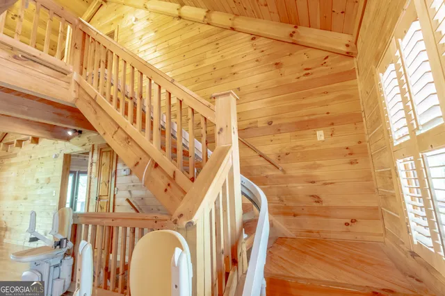 a view of a porch with wooden floor