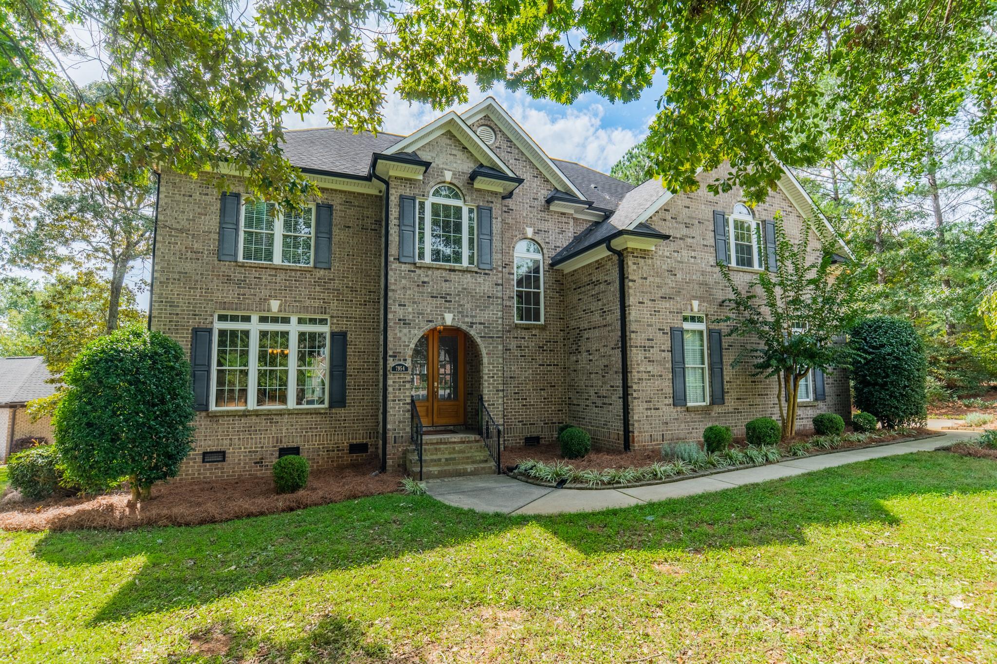 7954 Bay Pointe Drive Denver, NC 28037 - Photo 1 of 39 front view of a house with a yard
