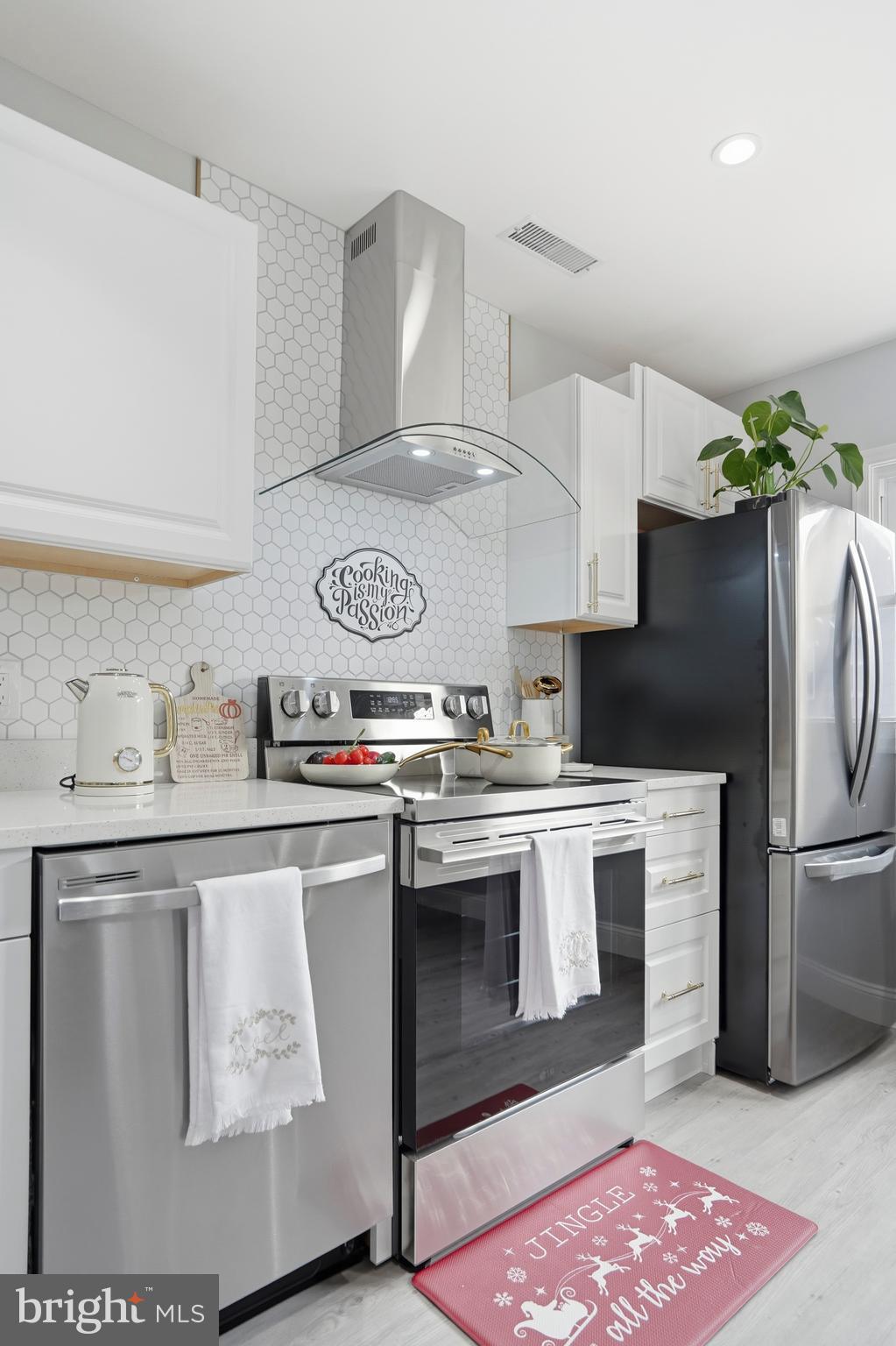605 Sequoia Drive Edgewood, MD 21040 - Photo 11 of 28 a kitchen with stainless steel appliances granite countertop a sink stove and refrigerator