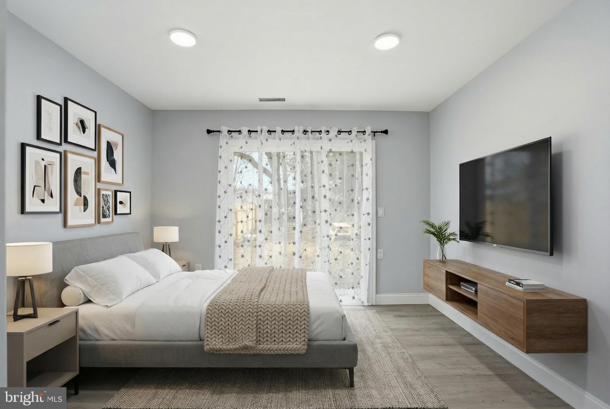 605 Sequoia Drive Edgewood, MD 21040 - Photo 16 of 28 a bedroom with a bed and a flat screen tv