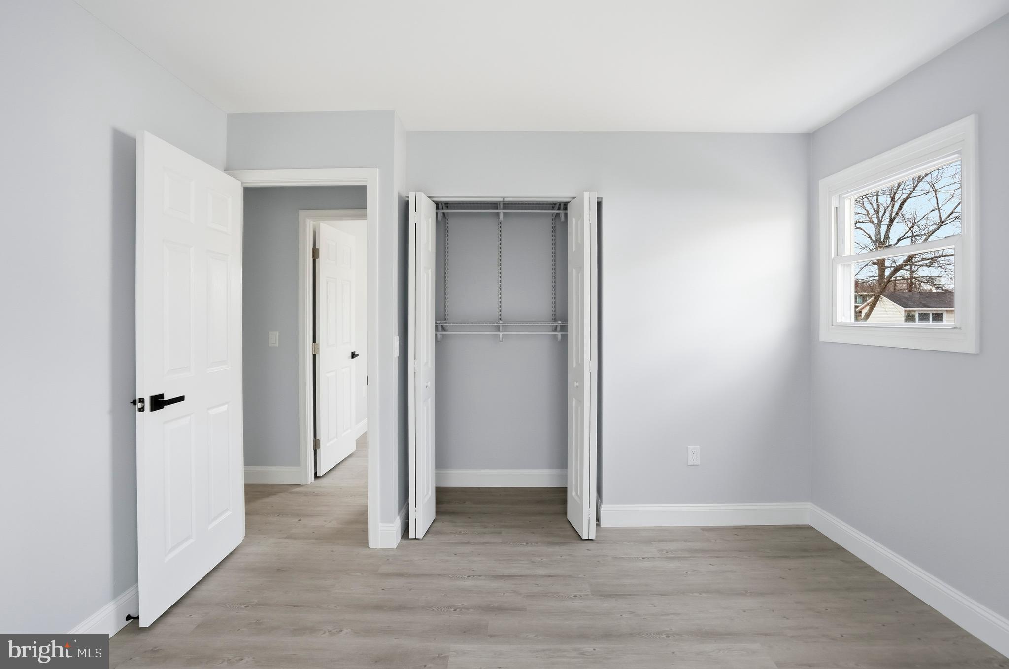 605 Sequoia Drive Edgewood, MD 21040 - Photo 19 of 28 an empty room with wooden floor and closet