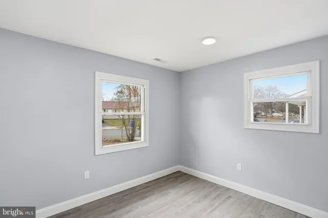 a bathroom with a shower and a toilet
