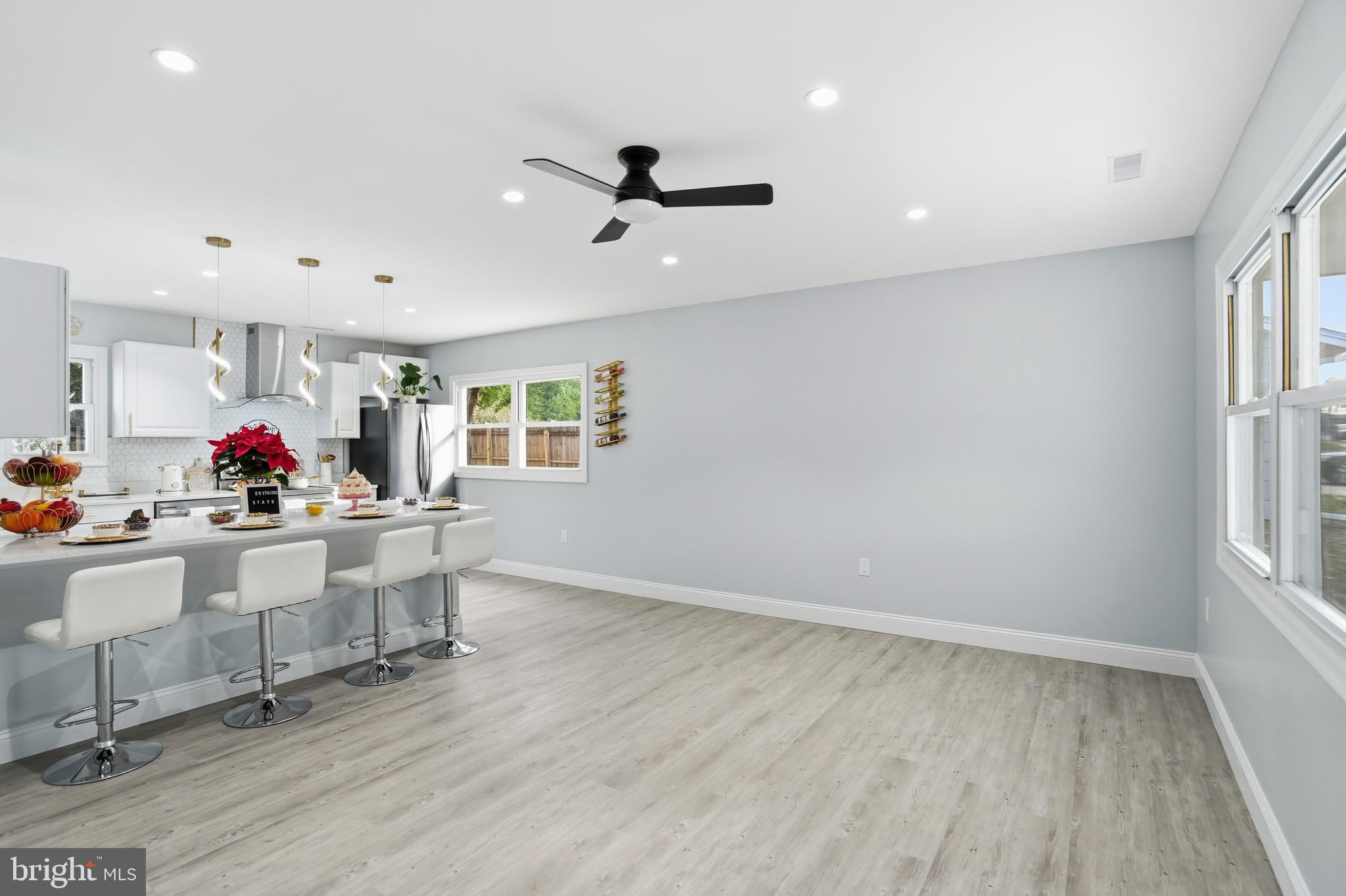 605 Sequoia Drive Edgewood, MD 21040 - Photo 6 of 28 a view of dining room and window with wooden floor and windows