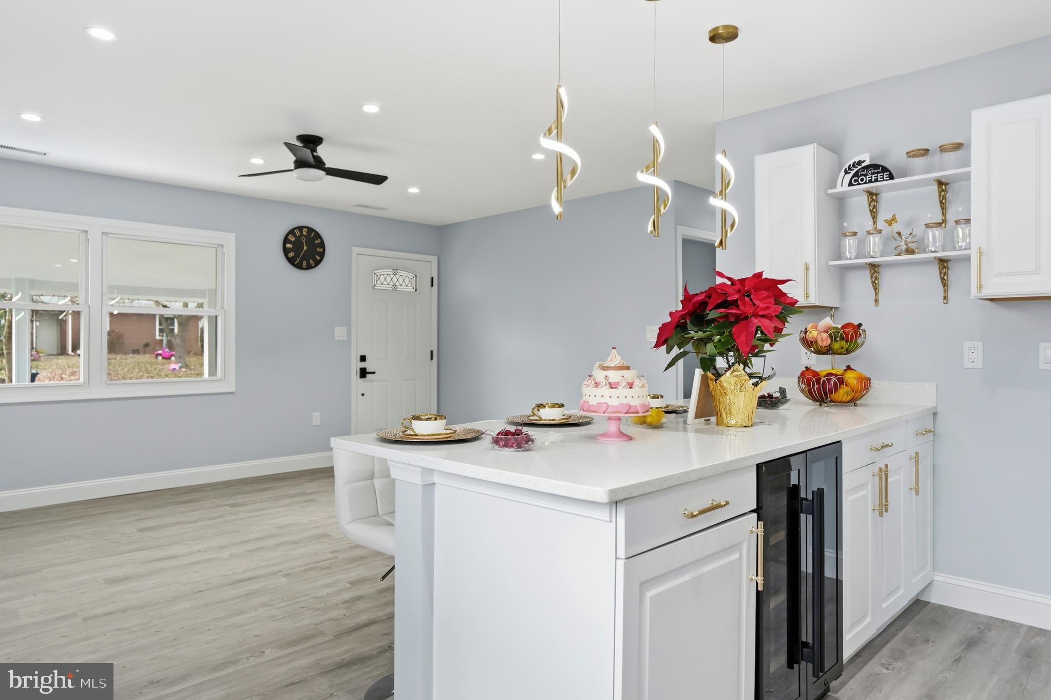 605 Sequoia Drive Edgewood, MD 21040 - Photo 28 of 28 a room with kitchen island a sink and a chandelier