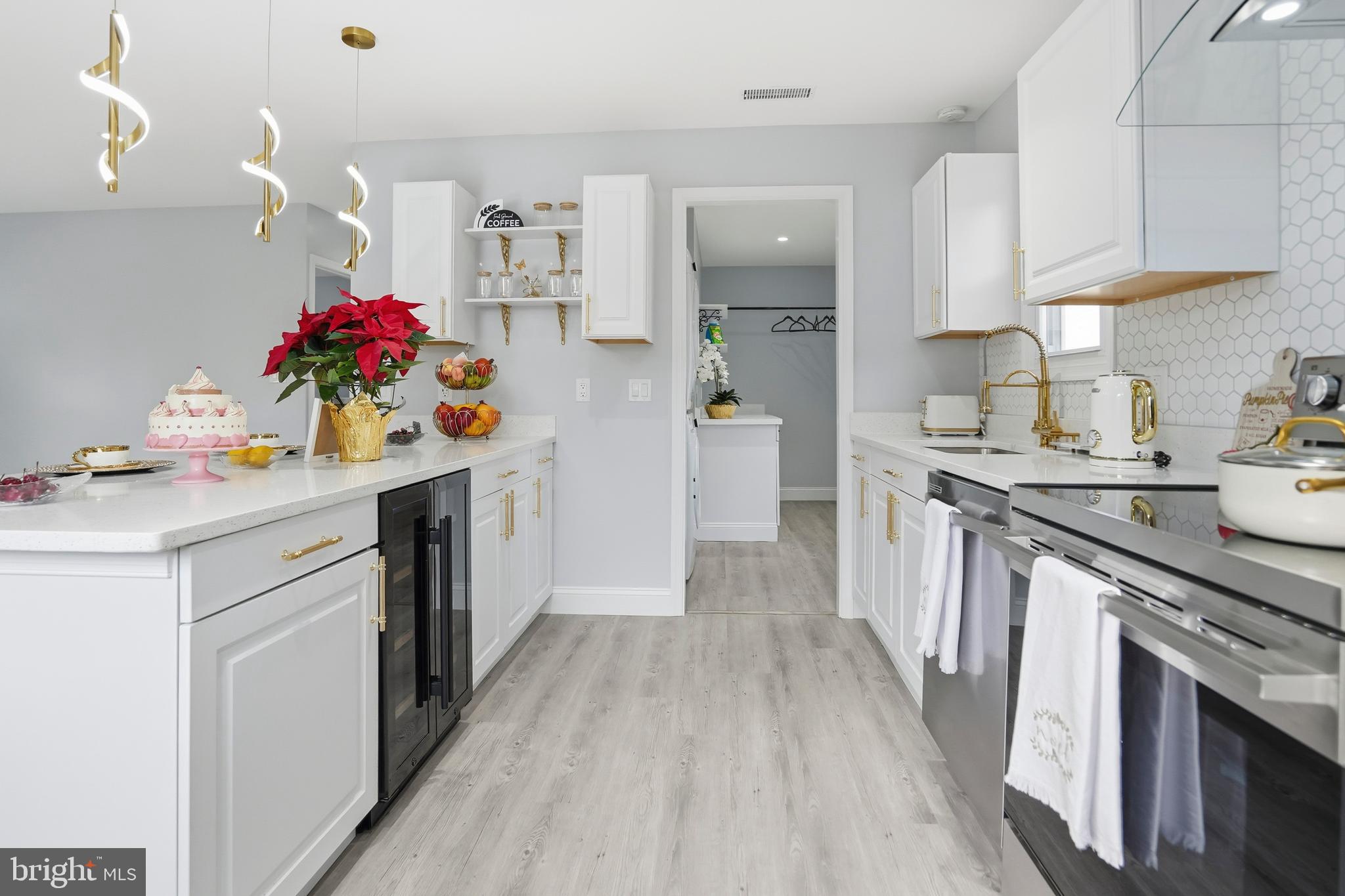 605 Sequoia Drive Edgewood, MD 21040 - Photo 8 of 28 a kitchen with a sink stove and cabinets