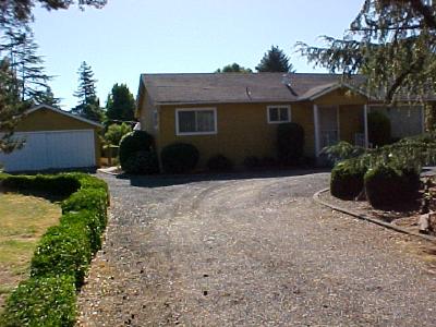 615 Ragle Road Sebastopol, CA 95472 - Photo 2 of 8 a front view of a house with a garden