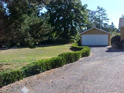 615 Ragle Road Sebastopol, CA 95472 - Photo 4 of 8 a backyard of a house with lots of green space