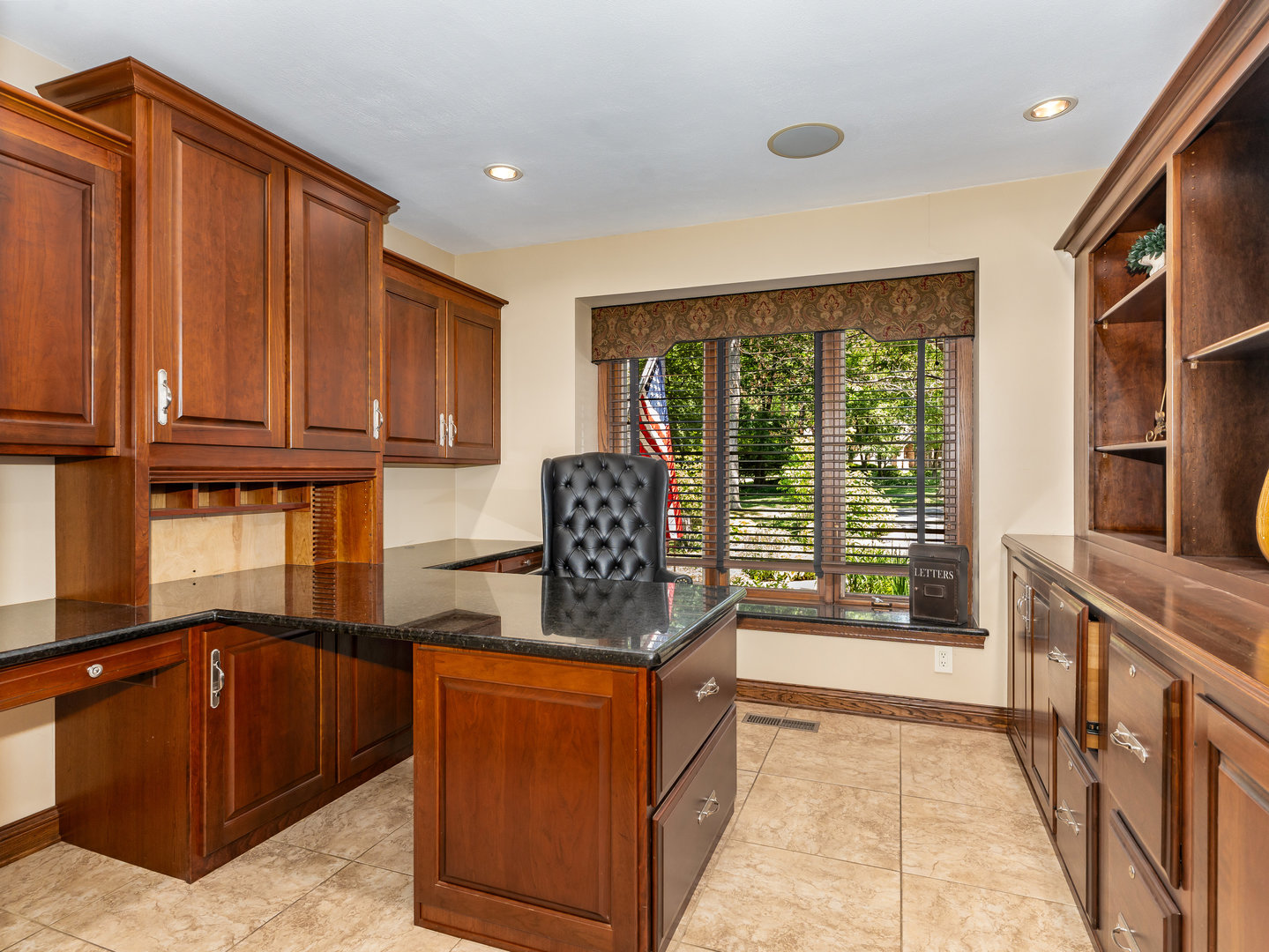 12 Arrowhead Lane DeKalb, IL 60115 - Photo 16 of 55 a kitchen with stainless steel appliances granite countertop a stove and a refrigerator