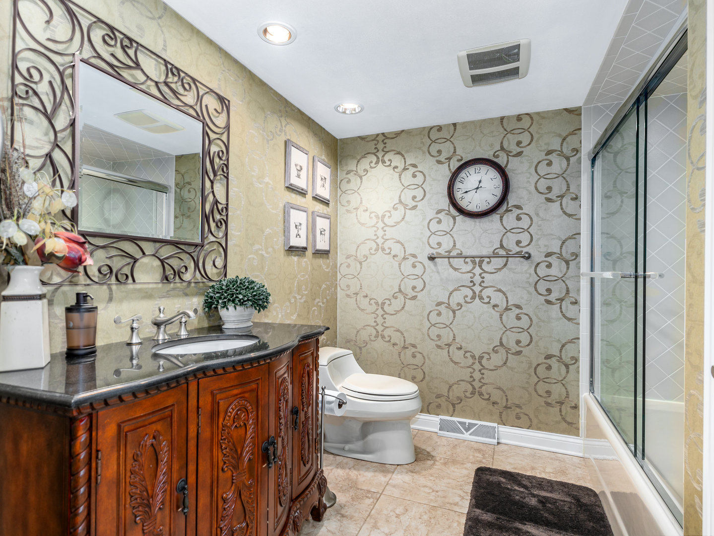 12 Arrowhead Lane DeKalb, IL 60115 - Photo 24 of 55 a bathroom with a granite countertop sink mirror vanity and toilet
