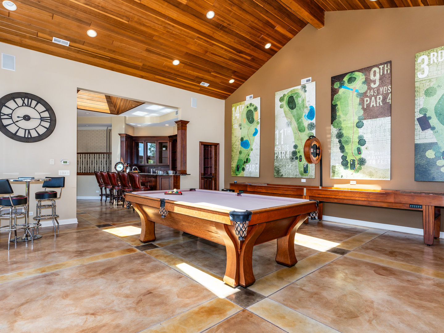 12 Arrowhead Lane DeKalb, IL 60115 - Photo 26 of 55 a living room with furniture a large window and a clock