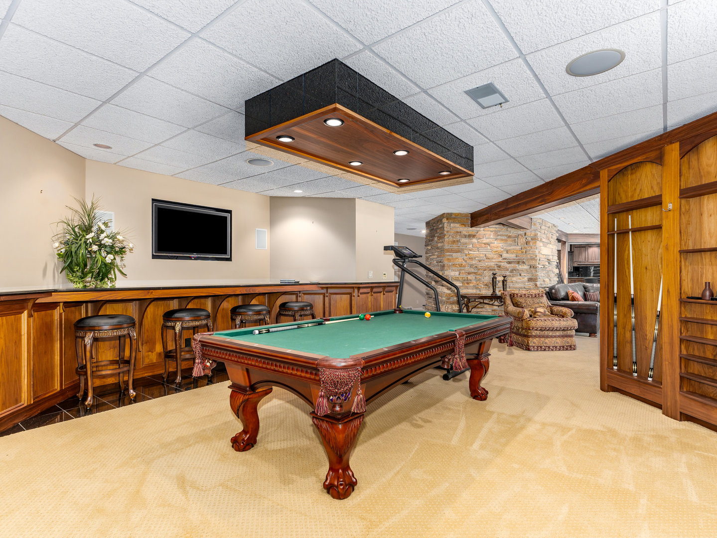 12 Arrowhead Lane DeKalb, IL 60115 - Photo 37 of 55 a room with furniture and flat screen tv