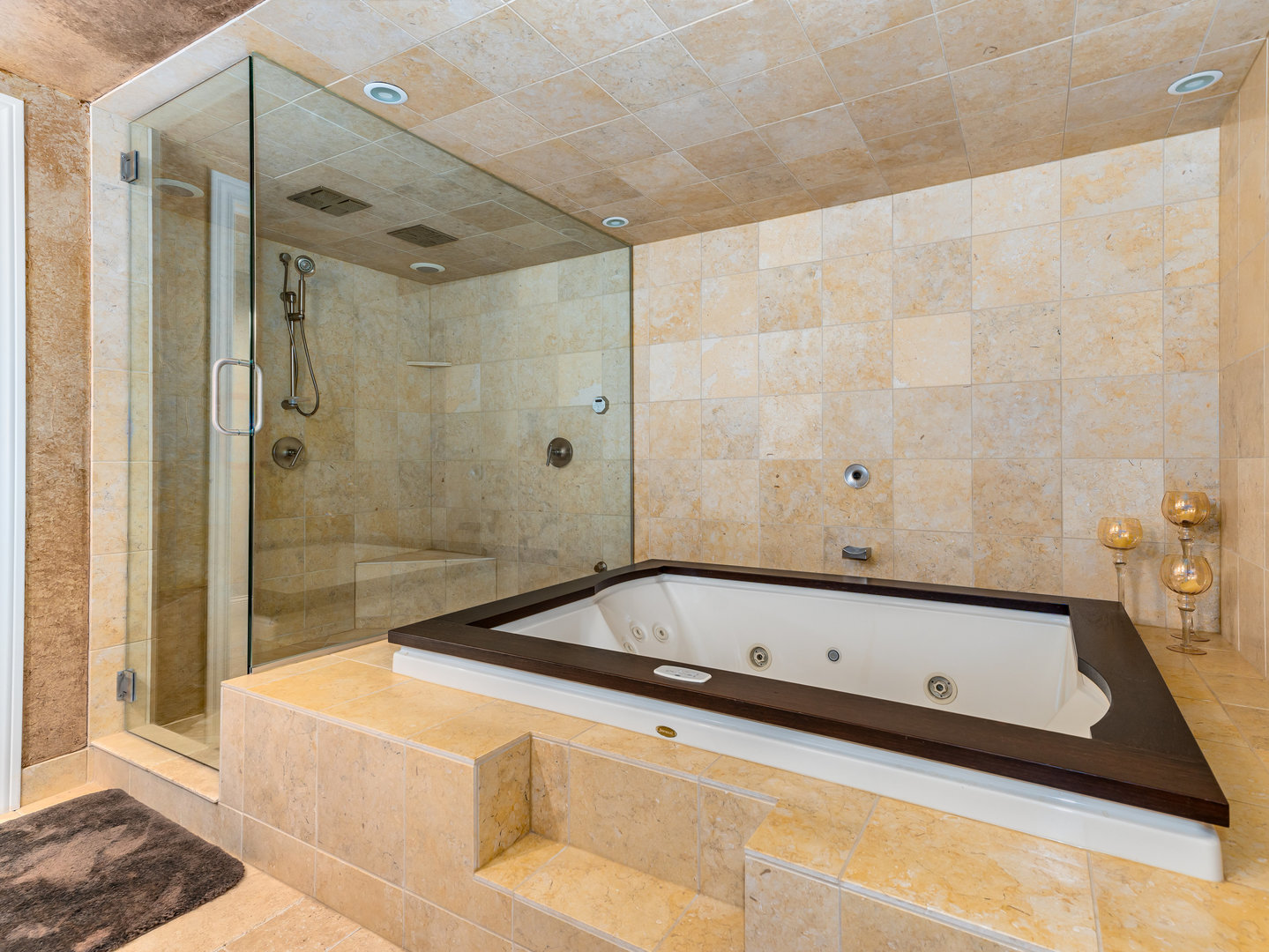 12 Arrowhead Lane DeKalb, IL 60115 - Photo 38 of 55 a bathroom with a tub a sink and a shower
