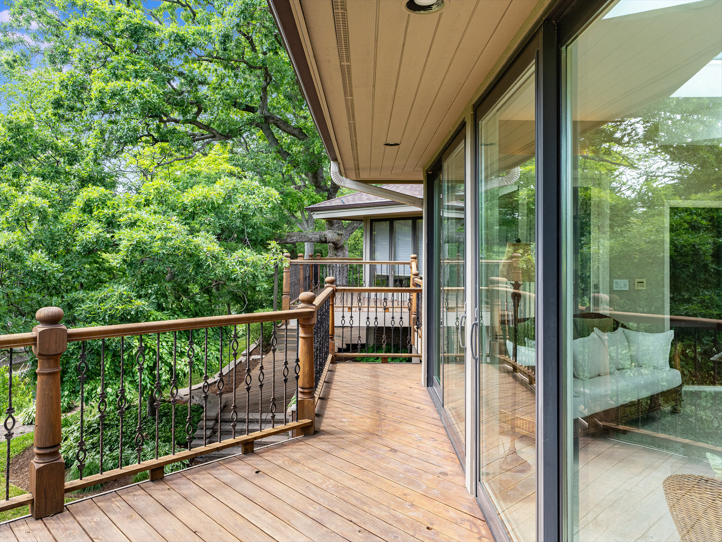 12 Arrowhead Lane DeKalb, IL 60115 - Photo 45 of 55 a view of balcony with floor to ceiling window and wooden floor