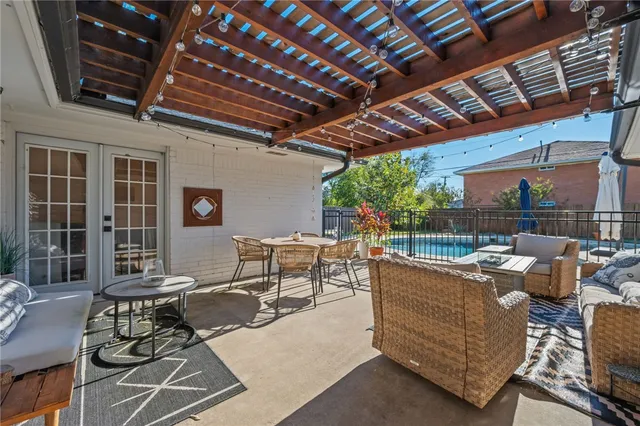 a living room with furniture and a outdoor space