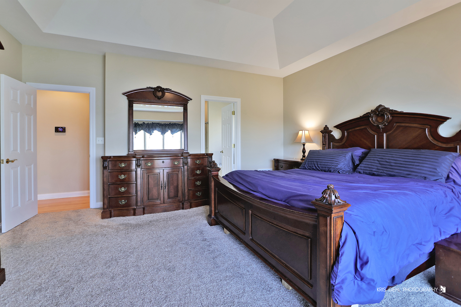 1265 Bayshore Drive Antioch, IL 60002 - Photo 14 of 42 a spacious bedroom with a bed and a mirror