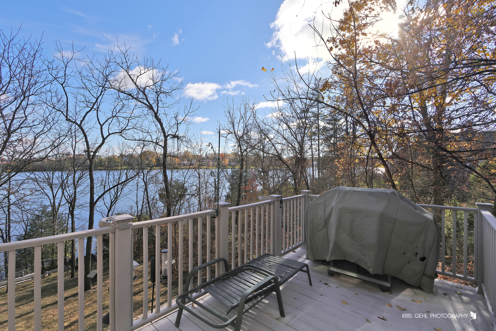 1265 Bayshore Drive Antioch, IL 60002 - Photo 18 of 42 a wooden fence with trees in the background