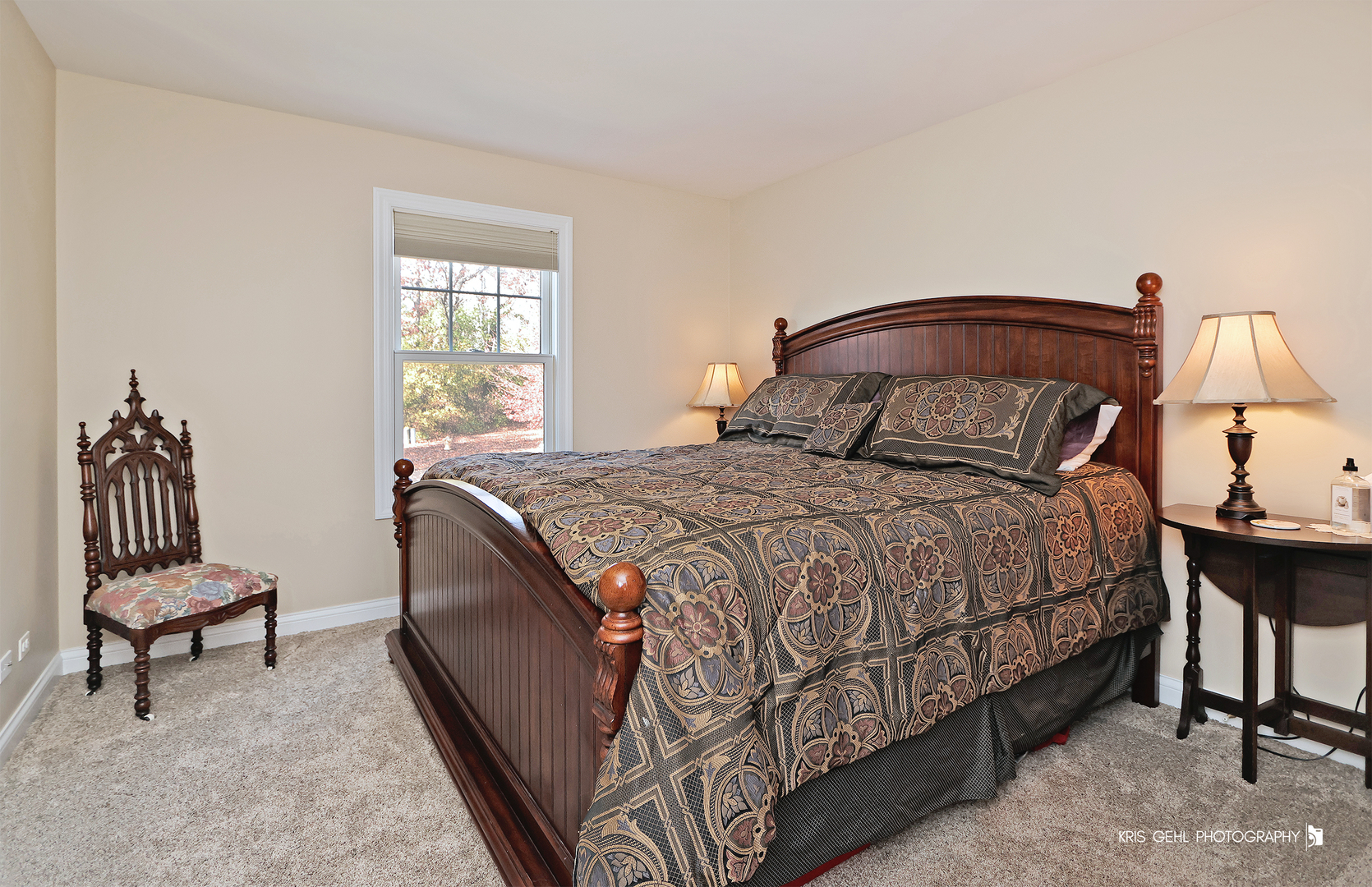 1265 Bayshore Drive Antioch, IL 60002 - Photo 22 of 42 a bedroom with a bed and chair