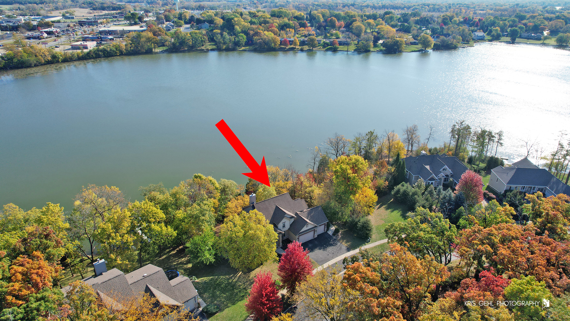 1265 Bayshore Drive Antioch, IL 60002 - Photo 38 of 42 a view of a lake with a house and a lake view