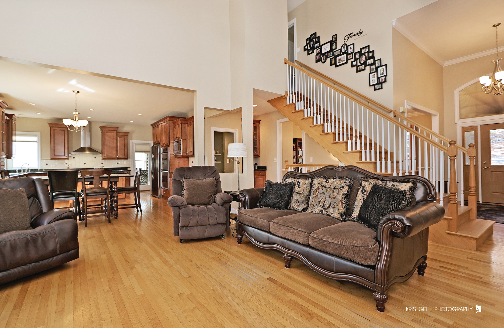 1265 Bayshore Drive Antioch, IL 60002 - Photo 5 of 42 a living room with furniture kitchen view and a wooden floor