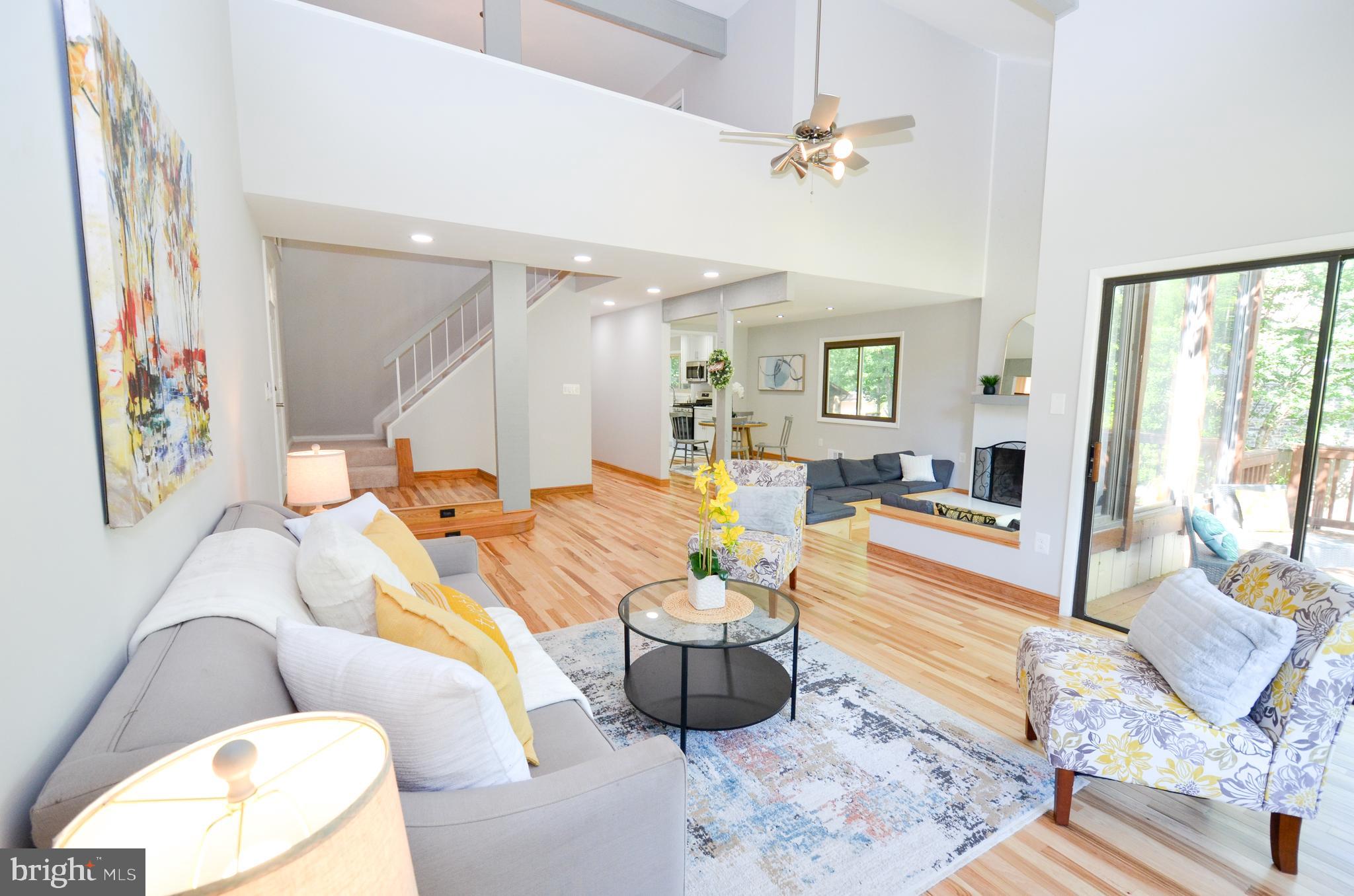 10601 Fiesta Road Fairfax, VA 22032 - Photo 56 of 58 a living room with furniture and a large window