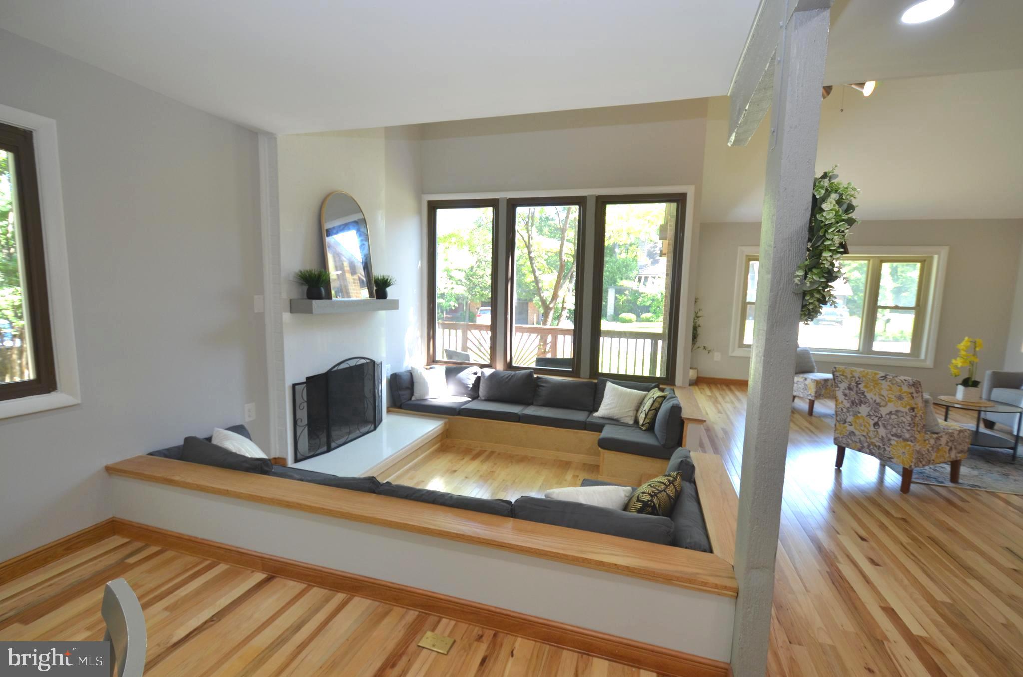 10601 Fiesta Road Fairfax, VA 22032 - Photo 20 of 58 a living room with furniture fireplace and flat screen tv